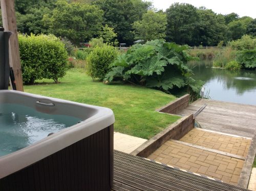 Mallard Hot Tub - Fishing Holidays in England at Mallard Lodge, Nanpusker Lakeside Lodges, Cornwall. This luxurious lodge overlooks a private fishing lake exclusively for guests staying at this lodge.