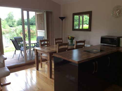 Mallard Dining Area - Fishing Holidays in England at Mallard Lodge, Nanpusker Lakeside Lodges, Cornwall. This luxurious lodge overlooks a private fishing lake exclusively for guests staying at this lodge.